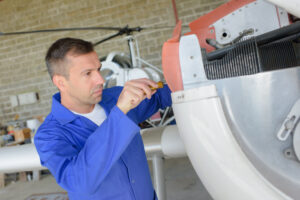 airframe mechanic inside the hangar