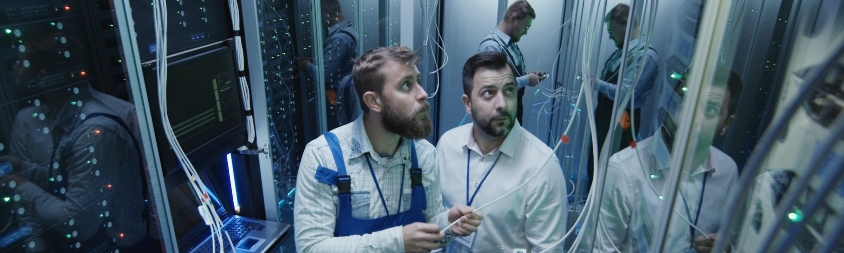 People working in data center server room